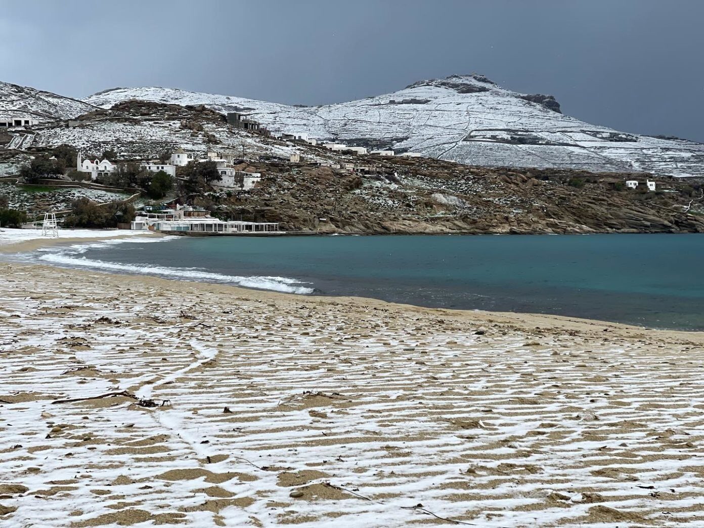 The famous beaches of Mykonos are covered in snow.