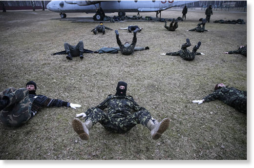  Members of a Maidan self-defense battalion take part in weapons training at a Ukrainian Interior Ministry base near Kiev