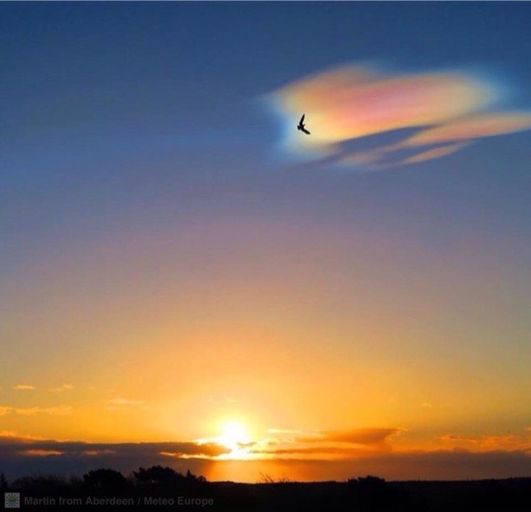 Glowing 'mother of pearl' clouds color Scotland's skies 