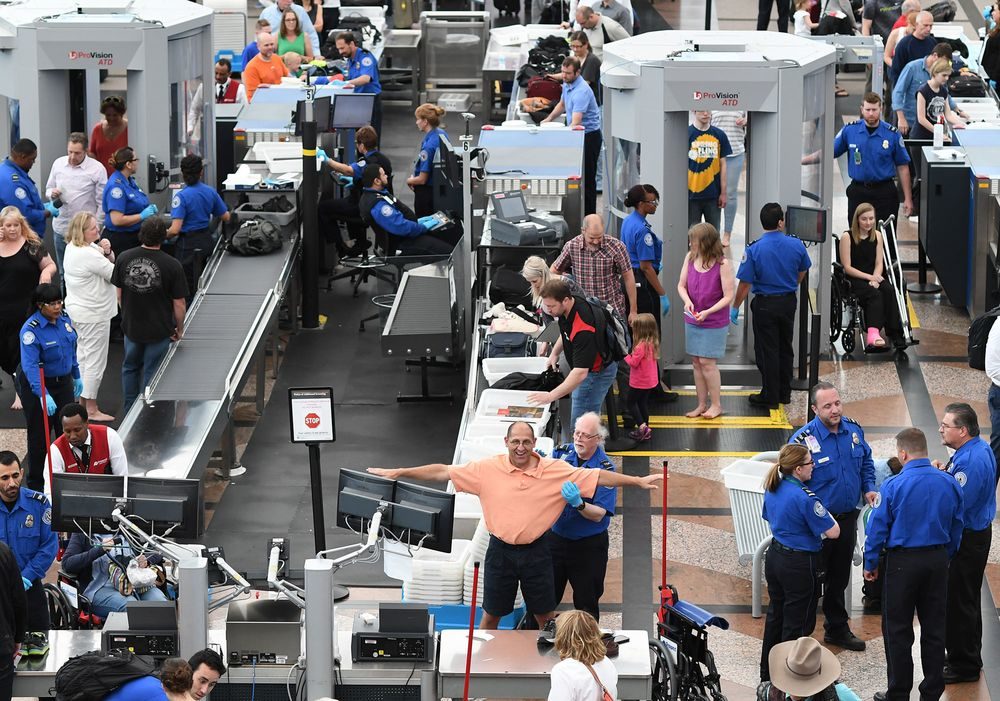 Travelers, at Denver International Airport