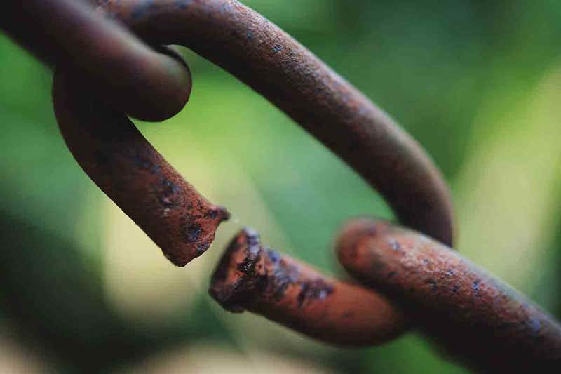 rusted chain broken link