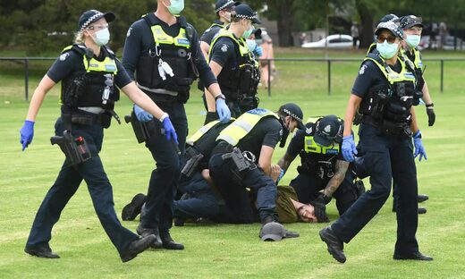 Melbourne anti-vaxxers arrested as hundreds rally in Australian capital ...