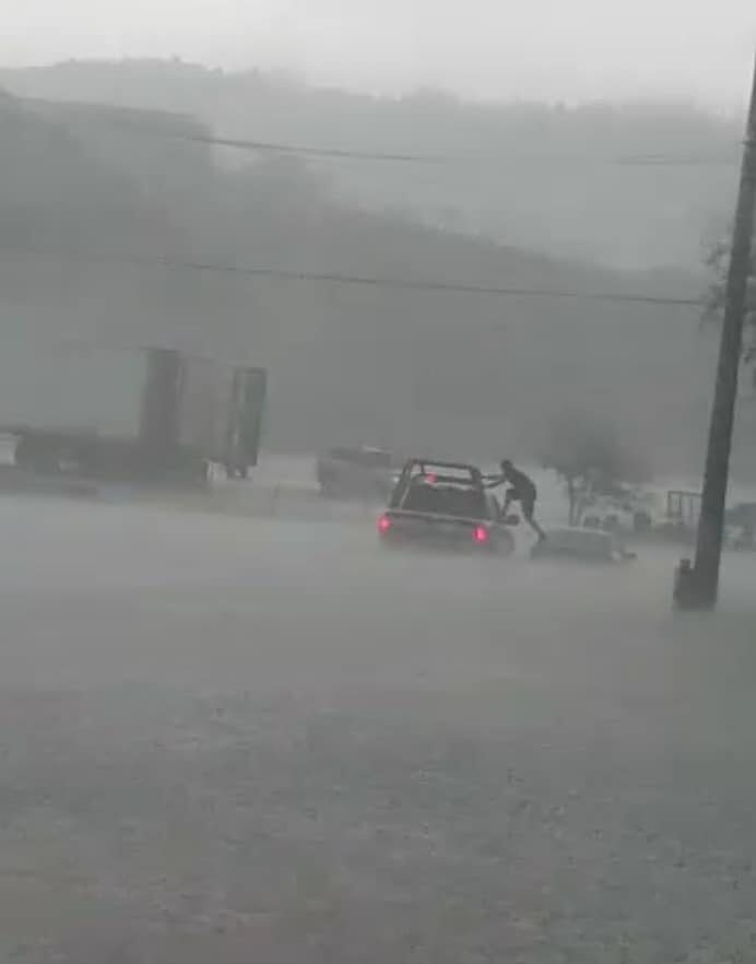 Flood rescue by police in Nogales, Sonora, Mexico, 23 July 2021.