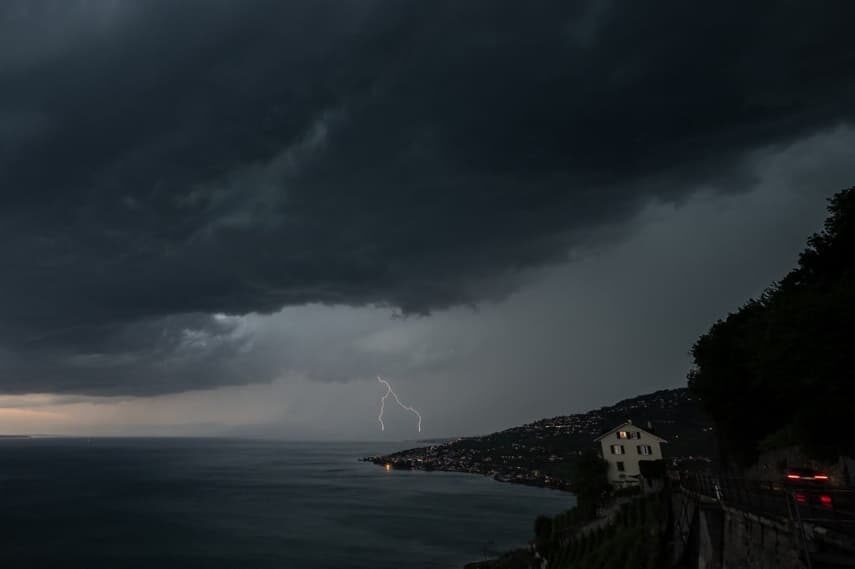 Lightning is seen above Lake Geneva from