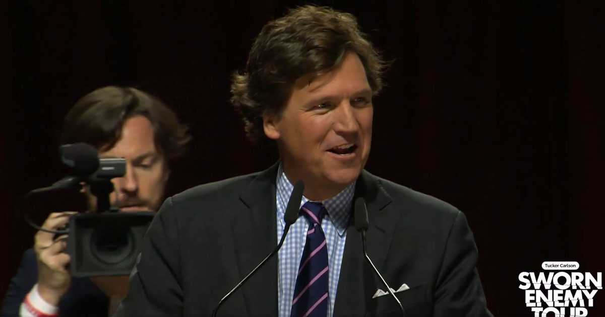 'I dare you to put it on TV': Crowd erupts as Tucker challenges ...