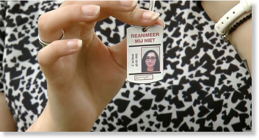 A hand holding the ID tag of Zoraya Ter Beek, a 28-year old Netherlands woman who has chosen euthanasia due to mental health issues. 3 She wore a “do not resuscitate” necklace for years.