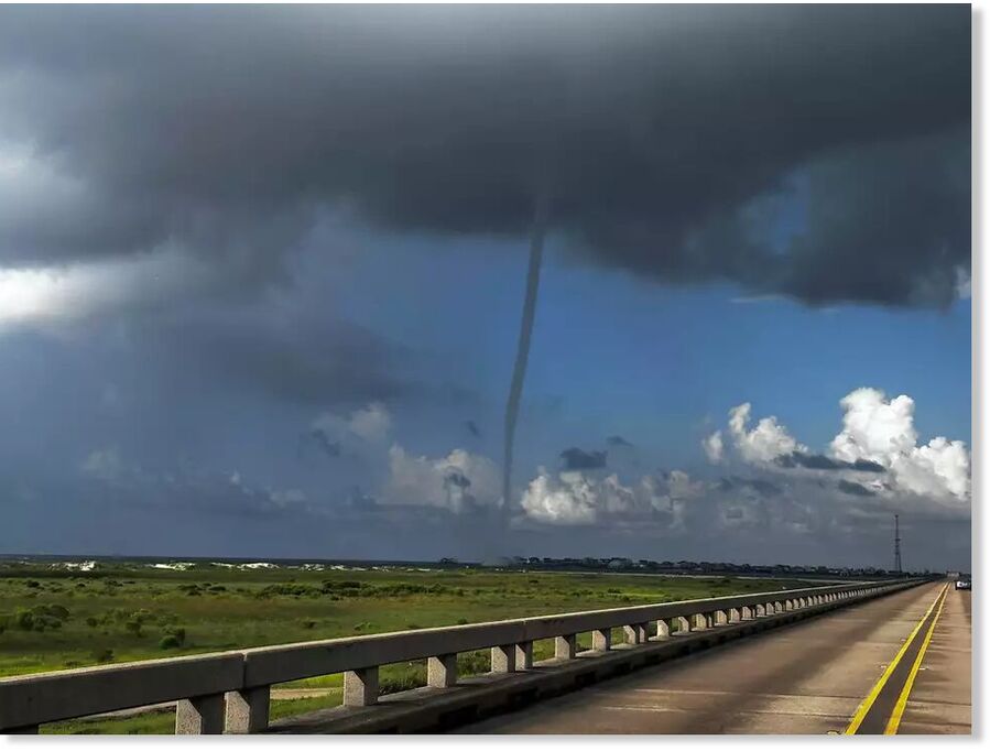 Joshua Nørregaard spotted the giant waterspout near San Luis Pass Bridge on Monday morning.   Joshua Nørregaard