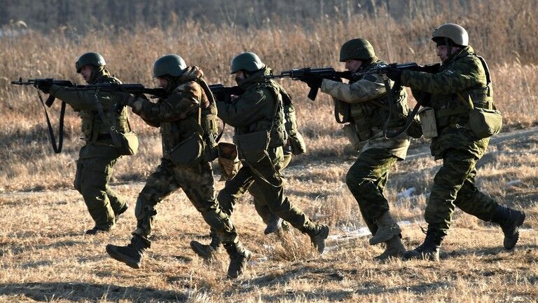 FILE PHOTO: Russian servicemen take part in a combat training