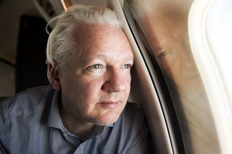 Assange free