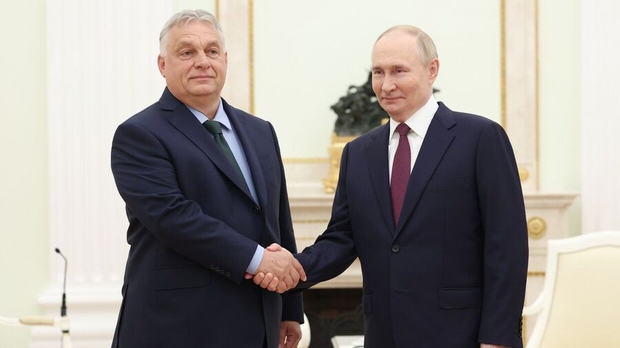 Hungarian Prime Minister Viktor Orban shakes hands with Russian President Vladimir Putin during a meeting in Moscow on July 5, 2024