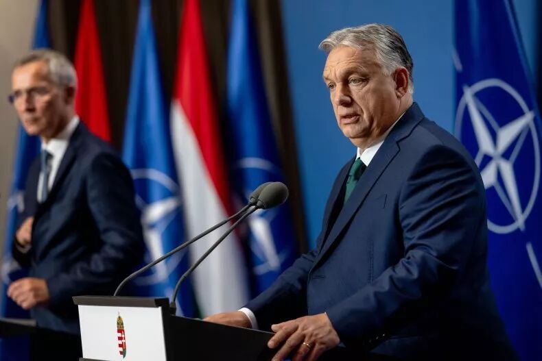 Hungarian Prime Minister Viktor Orban (R) and NATO Secretary General Jens Soltenberg