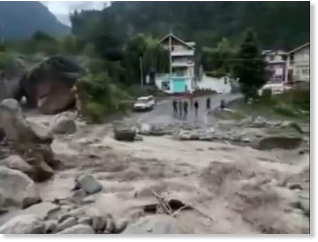 Section of NH-3 in Himachal Pradesh submerged under water due to the flash flood triggered by a cloudburst in Manali.