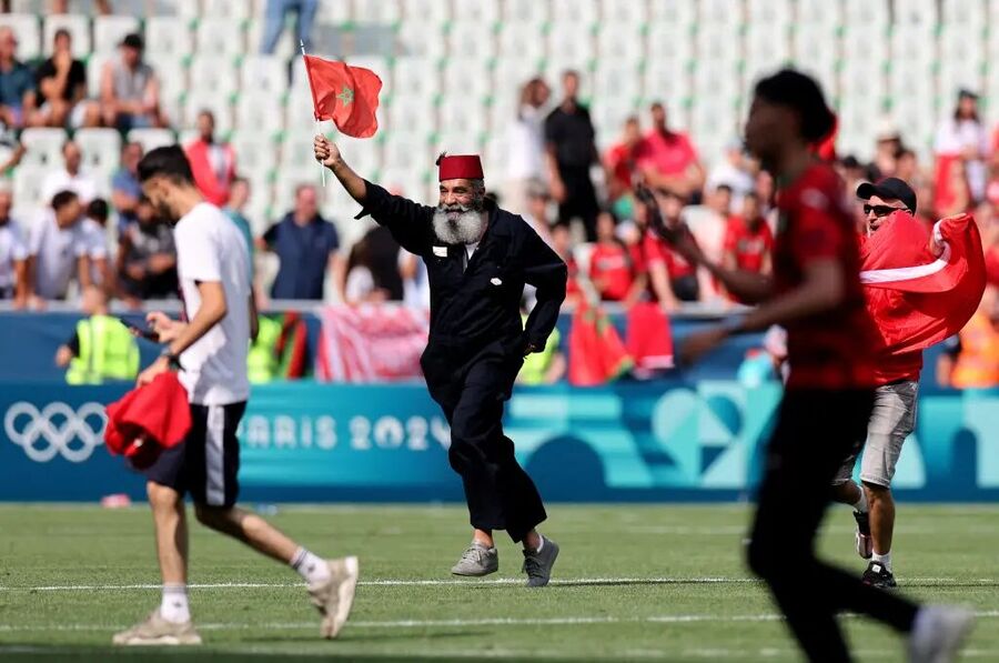 Argentina morroco soccer olympic fans field protest