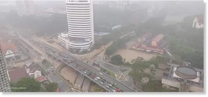 Flash floods were reported in parts of Kuala Lumpur following a morning downpour on Tuesday (Oct 15).