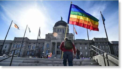 Demonstrators gather on the steps of the Montana State Capitol