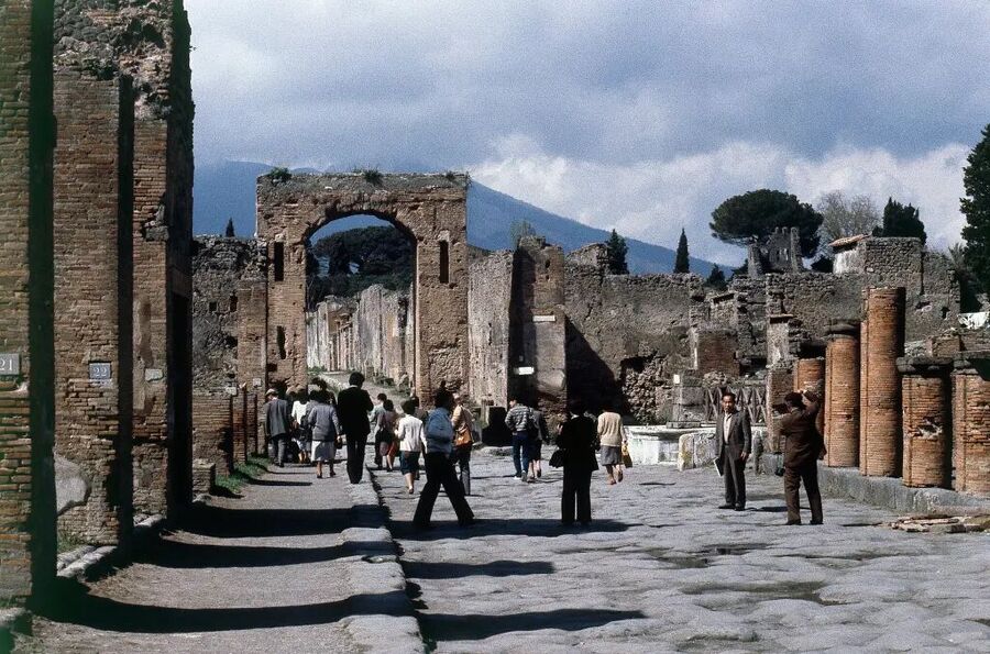 People walk through the husk of Pompeii, in 1979, 1,900 years after it was engulfed in ash and lava when Mount Vesuvius erupted.