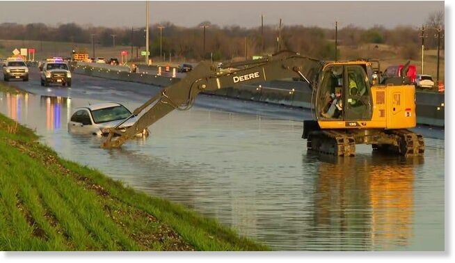 Click to enlarge A stretch of U.S. Highway 80 in Forney was flooded overnight